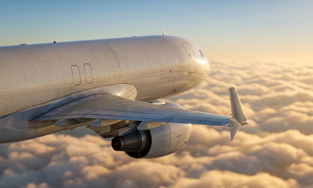 Passenger dies aboard Kenya Airways flight from Nairobi to Lagos Commercial passenger jet airliner cruising in golden light above clouds